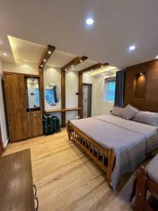 Postel nebo postele na pokoji v ubytování Serene Hills