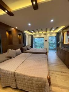 Postel nebo postele na pokoji v ubytování Serene Hills