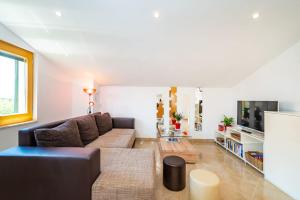 TV a/nebo společenská místnost v ubytování Apartments Lucija