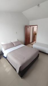 Легло или легла в стая в Casa Hotel San Rafael Armenia piso 2