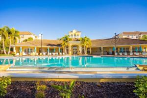 a swimming pool in front of a house at Leisure & Business Oasis-Near Convention Center in Orlando