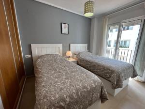 Ένα ή περισσότερα κρεβάτια σε δωμάτιο στο A Two Bed Apartment With Golf Views - RA4512LT +36 φωτογραφίες
