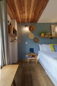 Cama o camas de una habitación en Hotel Plantación