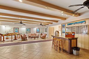 a lobby with a pool table and a bar at Kuleana Resort 104 in Kahana