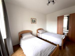 Postel nebo postele na pokoji v ubytování Apartment Darka