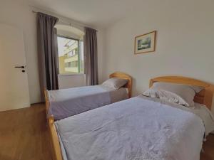 Posteľ alebo postele v izbe v ubytovaní Apartment Darka