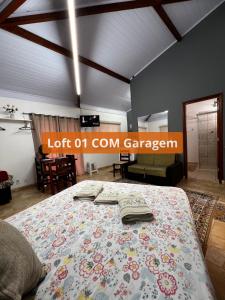 Ένα ή περισσότερα κρεβάτια σε δωμάτιο στο Loft família moraes
