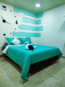 מיטה או מיטות בחדר ב-Hostal Carvajal