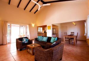 Posezení v ubytování Kas Vis with Private Pool in Upscale Punt Vierkant