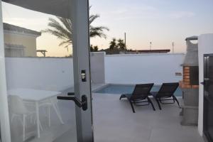 Un balcón o terraza en Villas Noah