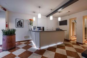 Kuchyň nebo kuchyňský kout v ubytování Best Western Hotel Armando
