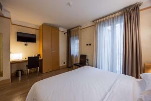Postel nebo postele na pokoji v ubytování Best Western Hotel Armando
