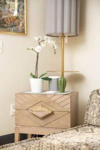 a wooden table with vases and flowers on it at Boho Lux in Atlanta +25 photos