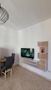 A television and/or entertainment centre at Tirana Central Home
