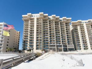 a large apartment building on the beach in the snow at Phoenix I 1153 in Orange Beach