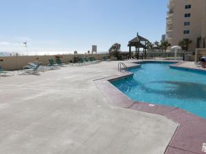 a swimming pool on the roof of a building at Phoenix I 1153 in Orange Beach