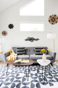 a living room with a couch and a table at Dapper Dan in Atlanta