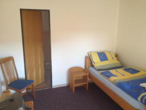 Postel nebo postele na pokoji v ubytování Hotel Atawa