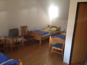 Postel nebo postele na pokoji v ubytování Hotel Atawa