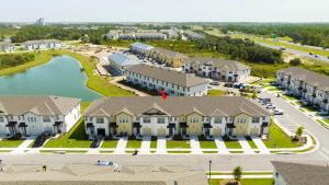an aerial view of a large apartment complex at Charming 3Bd Close to Disney at Enclave 1021 in Davenport