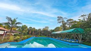 Bazén v ubytování Hostería Finca El Pigual nebo v jeho okolí + 22 fotografií
