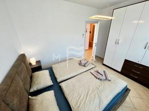 Ein Bett oder Betten in einem Zimmer der Unterkunft Orange 735