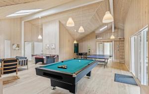 a room with a pool table and ping pong balls at Beautiful Home In Idestrup With Kitchen in Marielyst