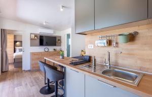 a kitchen with a sink and a counter top at 2 Bedroom Amazing Home In Banjole in Banjole