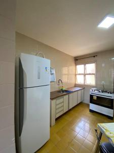 Nhà bếp/bếp nhỏ tại Ap Guilherme Ferreira Uberaba