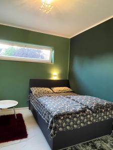 Ein Bett oder Betten in einem Zimmer der Unterkunft Guest room 1
