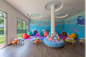 Posezení v ubytování Fusion Resort and Villas Da Nang + 37 fotografií