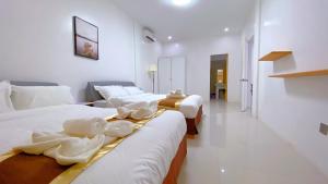 Säng eller sängar i ett rum på Green mango resort