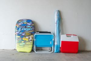 a group of suitcases sitting next to a wall at Sunset Serenity On The Cliffs! in San Diego