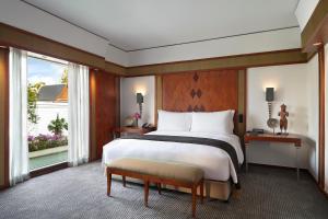 Ein Bett oder Betten in einem Zimmer der Unterkunft The Sukhothai Bangkok