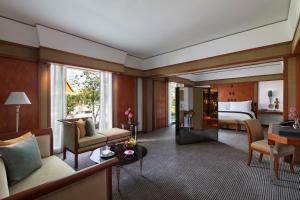 Ein Bett oder Betten in einem Zimmer der Unterkunft The Sukhothai Bangkok