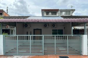 a house with a white fence in front of it at Stylish HomeStay Near JonkerWalk in Melaka