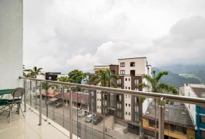 a balcony with a view of a city at apartamento 602 in Manizales