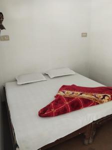 Postel nebo postele na pokoji v ubytování Hotel Shri Gyandeep