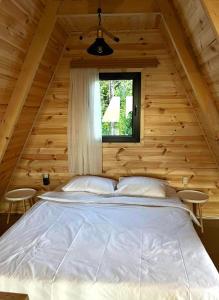 Ένα ή περισσότερα κρεβάτια σε δωμάτιο στο Cottage house of light B