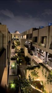 an overhead view of a building with street lights at Jriska apartment in Riyadh