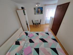 a view of a room with a geometric floor at Rooms Neda in Izola
