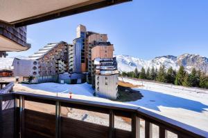 a view of a building from a balcony at Résidence Quartier Falaise - maeva Home - Appartement 2 pièces 7 personnes 454 in Avoriaz