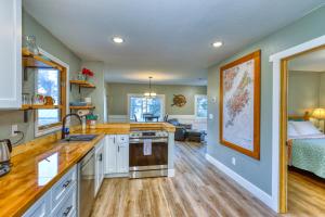 a kitchen with a sink and a counter top at Nautical Nook 2 Bedroom Getaway with Ocean Views in Kodiak