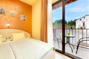 Postel nebo postele na pokoji v ubytování Apartments Erik B&B Adults only