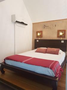Postel nebo postele na pokoji v ubytování 16 - LE VACOA - CHAMBRE 16 ETG D