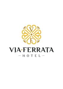 ein Logo für ein Hotel mit Mandala in der Unterkunft Via Ferrata Hotel in Prousós
