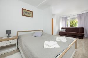 Postel nebo postele na pokoji v ubytování Older Krab