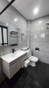 Koupelna v ubytování AY Homestay Midtown Falim + 16 fotografií