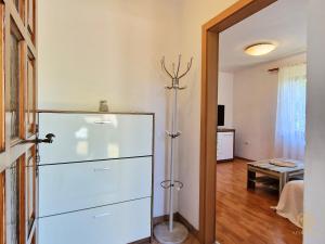 a room with a white dresser in a room at Apartment Saria Strunjan in Strunjan +33 photos