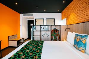 Voodi või voodid majutusasutuse ONOMO Hotel Kampala toas